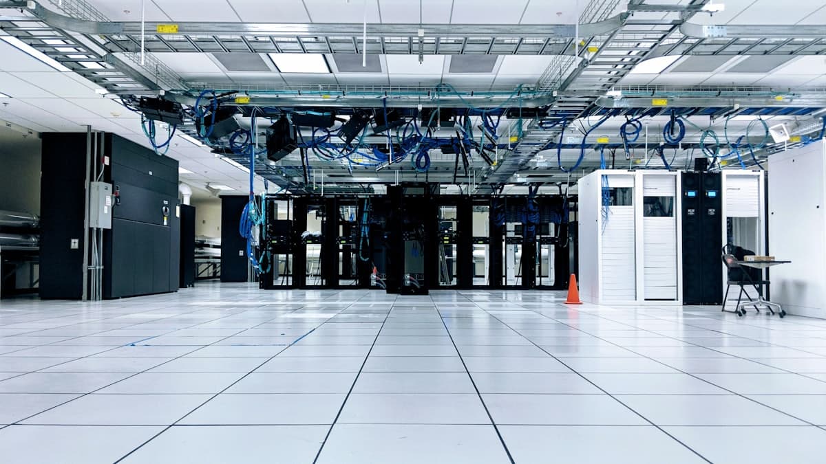 A row of server cabinets in a data centre